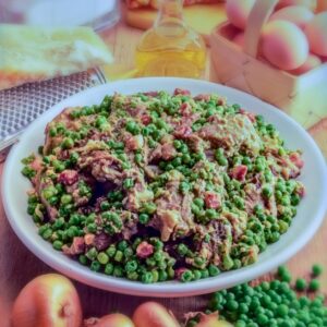 AGNELLO CON PISELLI