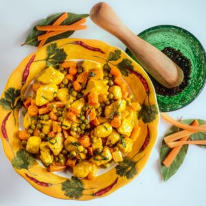 VITELLO ALLO ZAFFERANO CON CAROTE E PISELLI