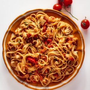 Spaghetti con seppioline e pomodoro