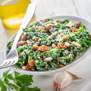 SPINACI CON PARMIGIANO E UVA SULTANINA - 1931