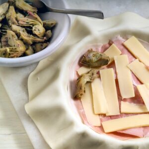 TORTA DELICATA CON CARCIOFI, PROSCIUTTO E FORMAGGI (STEP 3) - 1052