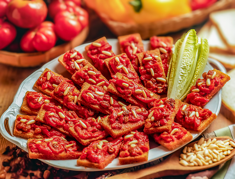 CROSTINI CON POMODORI PEPERONI E PINOLI - GR2054 - 4785 - immagine 1